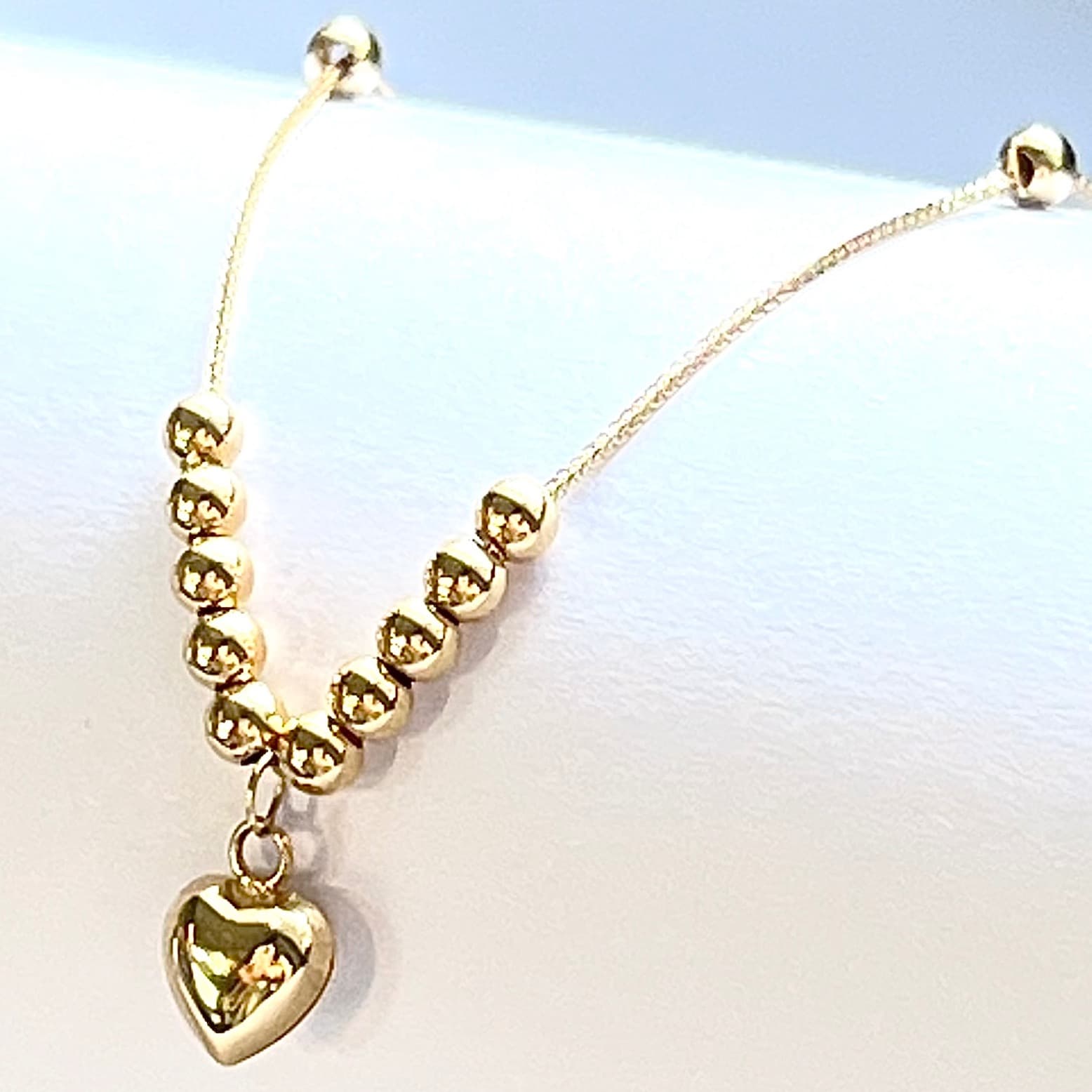 دستبند گوی و قلب عکس محصول